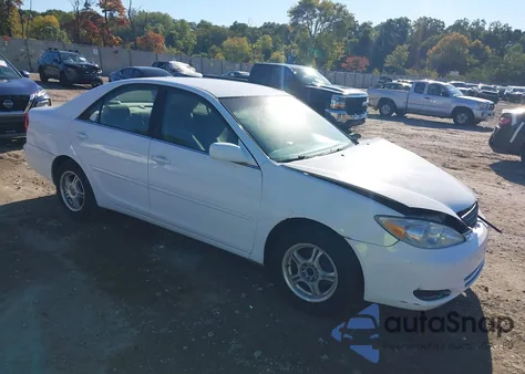 2002 Toyota Camry Le from USA, damaged, VIN 4T1BE32K82U042045